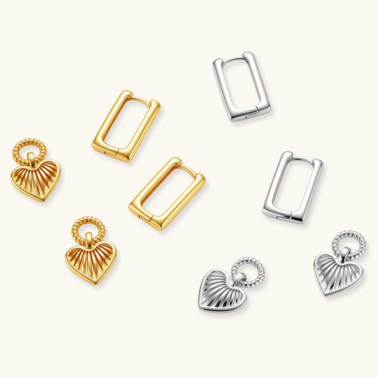 18K gold-plated rectangular huggie hoops with twisted rope ring and ribbed sunray heart charm pendant, on white background.